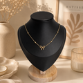 Golden Bow Charm Necklace